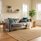 Gray sofa with decorative pillows in a living room setting